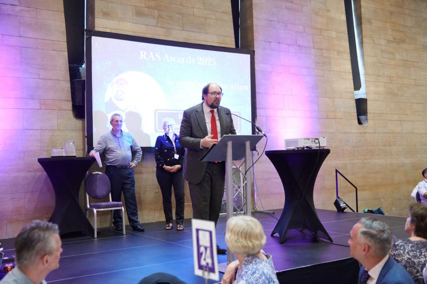 Dr Alex&nbsp;Calverley, of Surbiton High School, gives a speech after receiving the Secondary Education Award.