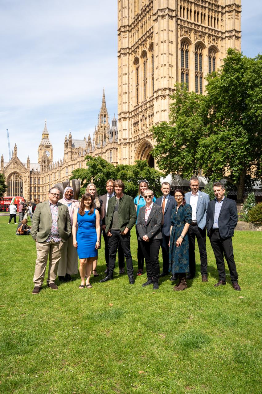 Stars of physics outside the Houses of Parliament.